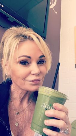 Tamilee Webb is drinking her diet shake.